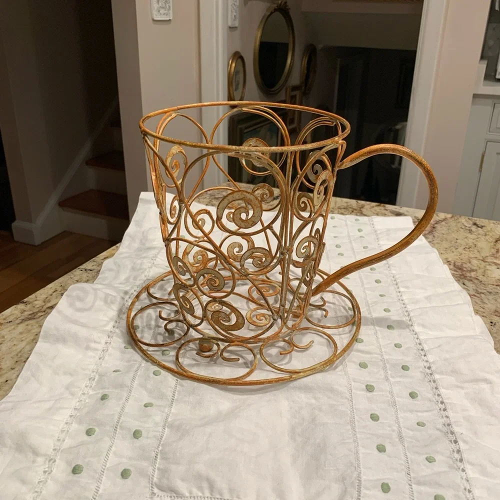 Large metal decorative tea cup